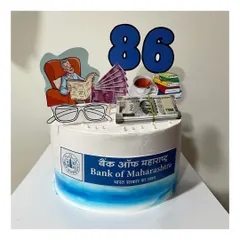 A special cake for a grandfather's 86th birthday, celebrating his career at Bank of Maharashtra. The vanilla strawberry cake is decorated with toppers representing his retirement hobbies.