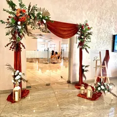 Another angle of the wedding entrance arch, showing how it frames the doorway and creates an inviting passage for guests into the main event hall.