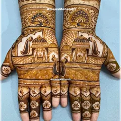 A complete view of a symmetrical bridal mehendi design. Both hands mirror each other with palace architecture, peacocks, and lotus details on the fingers.