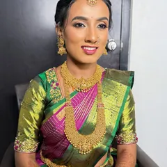 A smiling portrait of my dusky skin bride. The makeup is radiant and perfectly matched to her skin tone, enhancing her natural glow.