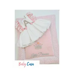 A beautiful personalized set for a little princess, featuring a dress with her initial 'A' and a matching quilted wrap. This is a perfect gift for a baby announcement.