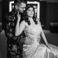 A stylish and moody black and white portrait from an engagement shoot. This shot has a classic, glamorous feel, perfect for celebrating this special milestone.
