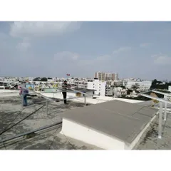 Our team at work setting up the mounting structures for a community solar project. We handle every aspect of the installation, ensuring a robust and durable framework for the solar panels.