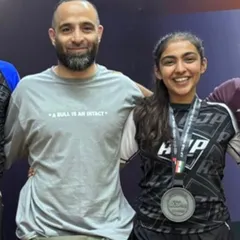 I am proud to introduce Yusra Akef Siddiqi, a multiple-time National MMA and Grappling Champion. Here she is with her medal, a testament to her hard work and the high level of training we provide.