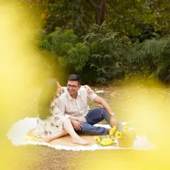 We always make time for couple's portraits during a family session. This shot captures the parents enjoying a quiet, romantic moment together during their outdoor picnic shoot.
