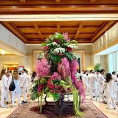 Here you can see the installation in the context of the busy lobby, with guests gathering around. My goal is to create art that people can experience and that enhances the ambiance of the space.