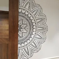A closer look at a half-mandala mural I painted in a living room in Bangalore. This design adds a touch of spiritual elegance without overwhelming the space.