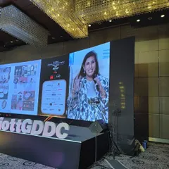 A close-up of our director speaking on the panel, sharing insights on the importance of art in luxury spaces.