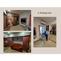 This drawing room was designed to be a multi-functional space. It includes a comfortable sofa, a dedicated work-from-home desk area, and ample storage, all tied together with a calming, nature-inspired wallpaper.