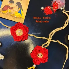 Celebrate your bond with our Bhaiya-Bhabhi Rakhi combo. This set features two beautifully coordinated floral rakhis, handcrafted with soft silk-blend threads for a comfortable and special feel.