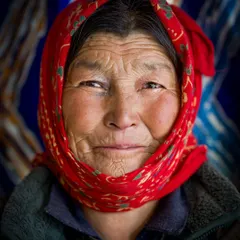 A portrait of a Ladakhi woman, her face a beautiful map of a life lived with resilience and grace. Shot in her village using only natural light, this image seeks to convey the quiet strength and deep-rooted culture of the Himalayan people.