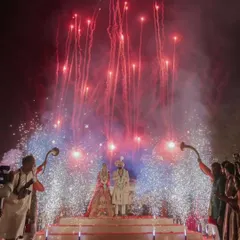 I believe every union deserves a grand beginning. This shot captures the pinnacle of celebration, where I coordinate spectacular fireworks and dramatic lighting to create a breathtaking, unforgettable moment for the couple and their guests.