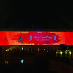 A clear view of the vibrant, high-resolution LED screen displaying custom graphics for the 'Divya Darshan'. Our LED wall rental services ensure your content is seen with perfect clarity, even at large-scale outdoor events.