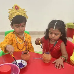 Little Krishnas and Radhas getting creative. During our Janmashtami event, children dressed in traditional costumes and had a wonderful time painting their own matkis (pots).