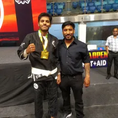 With my coach after winning the gold medal. Having good guidance is just as important as training hard, and I am thankful for the support I receive.