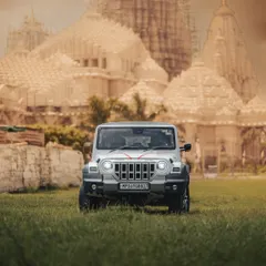 A powerful image of the Mahindra Thar set against the backdrop of the sacred Kundalpur temples. This shot connects the vehicle's adventurous spirit with my own personal journey and faith, showing how a car can be part of a deeper story.