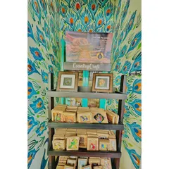 A look at the 'Country Craft' display at our cafe. We love supporting local artisans and giving them a space to share their beautiful, handcrafted products with our community.