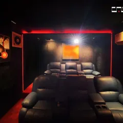 A full view of the seating arrangement in the home theater. The tiered layout ensures everyone has a perfect view of the screen, just like in a real cinema.