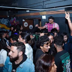 A packed house is the best compliment. This shot captures the close-knit, high-energy vibe I love to create, making everyone feel like part of the party.