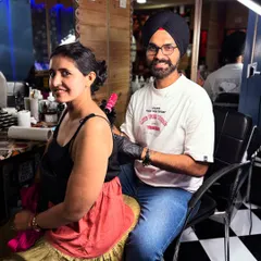 Me with a happy client after finishing her spiritual backpiece. Building a good connection and making you feel comfortable is a big part of the process.