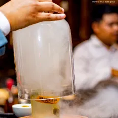 Experience the drama of our signature smoked cocktails at Nakshatra. We believe a drink should be an experience, and this one is designed to delight your senses with its aromatic reveal and complex flavors.