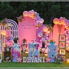 For Dhvani's first birthday, I designed this breathtaking butterfly-themed party in a beautiful garden setting. The decor features large, intricate butterfly wings, soft pink backdrops, and marquee lights, all coming together to create a magical outdoor celebration.