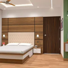 This bedroom features a full-wall wood panel behind the bed, which has a tufted cream headboard. The matching bedside tables and vanity complete the warm, inviting look.