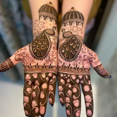 A majestic design featuring large peacocks and architectural domes. The lower part of the palms is filled with a dark, bold floral pattern, creating a stunning contrast.
