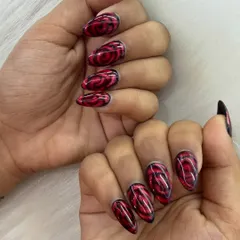 A dramatic and romantic design. I created this deep red rose pattern on each nail for a look that is full of passion and artistry.
