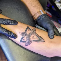 Here is a finished custom piece combining animal and geometric tattoo styles. I designed this eagle with sharp, clean lines and bold triangular elements to create a modern and symbolic forearm tattoo.