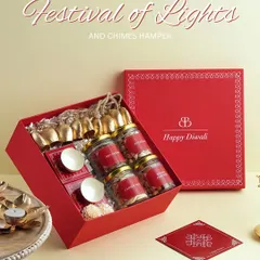 The vibrant "Festival of Lights" hamper, one of our bestsellers for Diwali. This box is curated with traditional treats and festive decor, designed to bring a smile to anyone who receives it. It’s a perfect way to share festive cheer with your team.