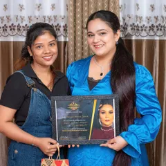 A happy moment on certification day. My goal is to empower every student with the confidence and skills needed for a successful career in beauty.