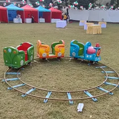 Our mini train rental is a charming addition to any outdoor event. The train consists of an engine and several colorful carriages, running on a circular track we assemble on-site.