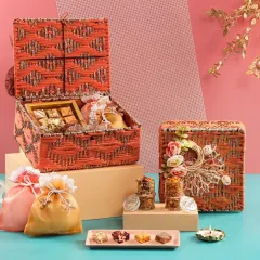Another look at our orange jute hampers, showing one open to reveal the contents. These boxes are designed to be reusable, extending the life of your thoughtful gift.