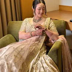 Not getting over that infectious smile anytime soon. This candid shot captures her pure joy, with her radiant makeup looking flawless from every angle.