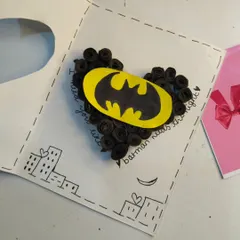 "I need you like Batman needs the night." This handmade card is perfect for the superhero fan in your life, featuring a heart made of black paper quills and the iconic Batman logo.