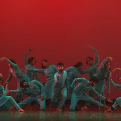 A group of our students performing a Bollywood fusion piece at SparkLights. Their synchronized movements and vibrant energy light up the stage in this colorful and dynamic performance.