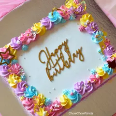 A unicorn-themed sheet cake, which is great for larger parties. I decorated the border with colourful unicorn-palette buttercream swirls, stars, and a unicorn horn.