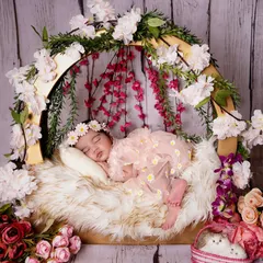 A wider view of this floral moon prop, showing how I build a complete, beautiful scene around the sleeping baby. Your baby's safety and comfort are always my first priority in every setup.