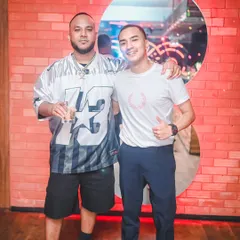 Me with a fan at the club. I always make time to connect with the people who come out to my shows.