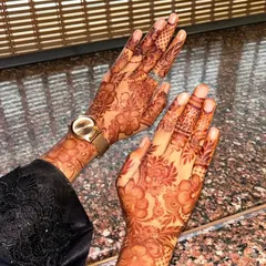 The beautiful result of a floral henna design after the paste has been removed. The stain starts as a bright orange and will darken over the next 48 hours.