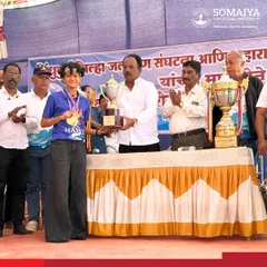 Janhavi Dhami celebrates with her trophies after winning two gold medals and the Overall Fastest Girls Runner-Up trophy at the Sindhudurg Ocean Swimathon.