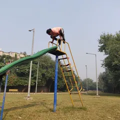 Having some fun with Bakasana, or crow pose, on top of a slide. This arm balance requires significant core engagement, arm strength, and a bit of playful courage.
