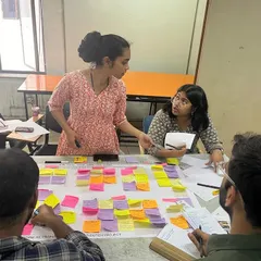 Guiding students through a complex mapping exercise. Mentorship is about providing direction while allowing students the space to explore their own ideas and develop their unique perspectives on urban design.
