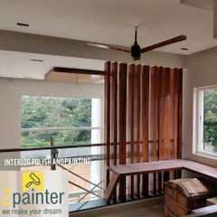 This custom-built wooden partition and bench features a high-gloss polish. The reflective surface adds depth and elegance to the living space, making it a central feature.