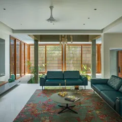 The living room at 'The Mantle', which opens up to an internal courtyard, blurring the lines between inside and out.