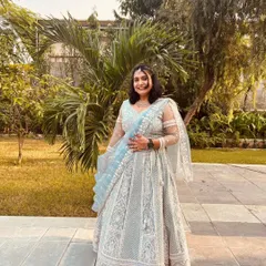 Another shot of the powder blue lehenga in an outdoor setting, showing how beautifully it photographs in natural light.