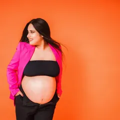 For the mama with bold and beautiful energy. This color-block studio look shows that maternity photography can be modern, vibrant, and full of attitude. Let's celebrate your strength with a fashion-forward maternity session.