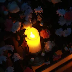The soft glow of a single candle nestled among fresh flowers. It's these small, beautiful details that come together to create a truly romantic and memorable experience.