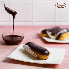 A classic French Chocolate Eclair, filled with delicate cream and topped with a rich, glossy chocolate glaze. This is one of the timeless pastries that our regulars have loved since the very beginning.